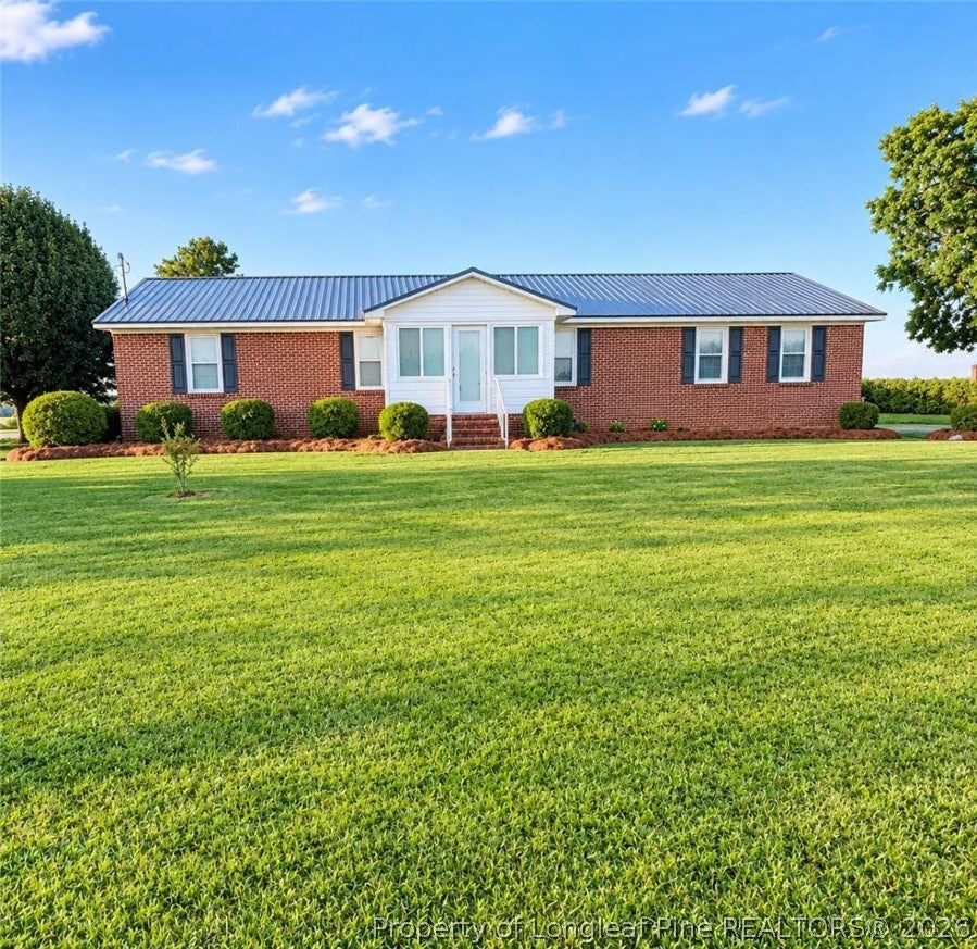 Photo of 6080 Suttontown Road, Faison, NC 28341 (MLS # 771524)