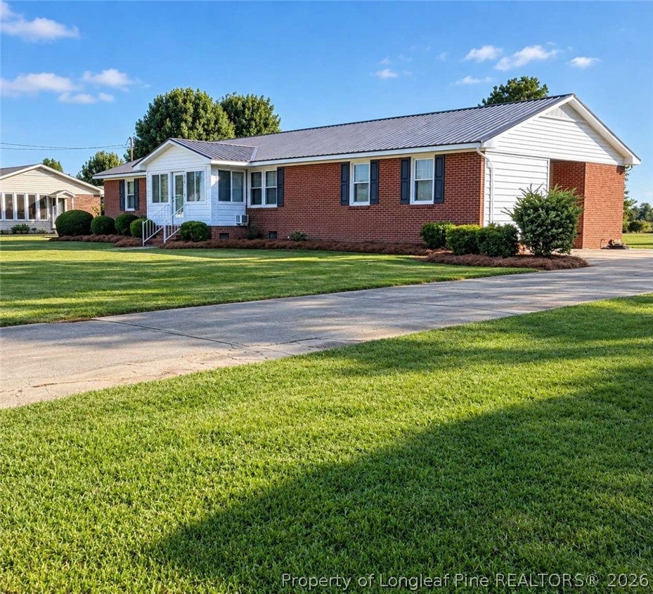 Photo of 6080 Suttontown Road, Faison, NC 28341 (MLS # 771524)