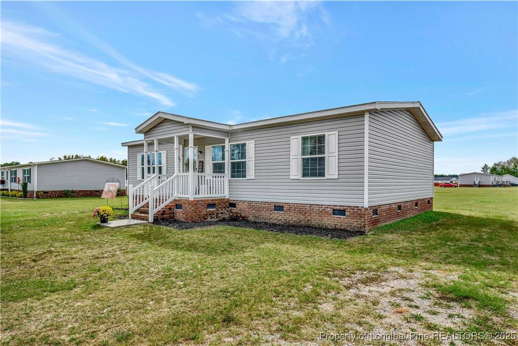 Photo of 7879 Chicken Road, Lumberton, NC 28360 (MLS # 752330)