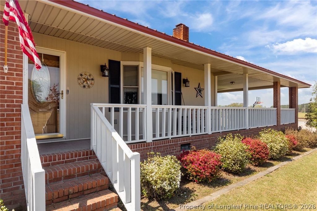 Photo of 1411 Scott Currie Road, Raeford, NC 28376 (MLS # 760235)