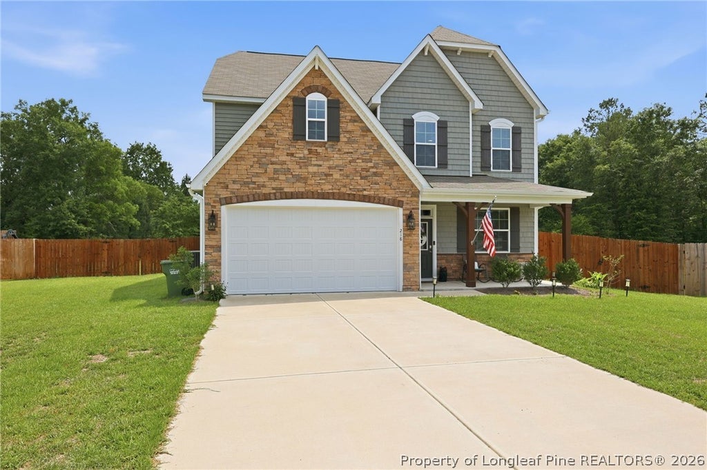 Photo of 218 Woodsrun Street, Raeford, NC 28376 (MLS # 764170)