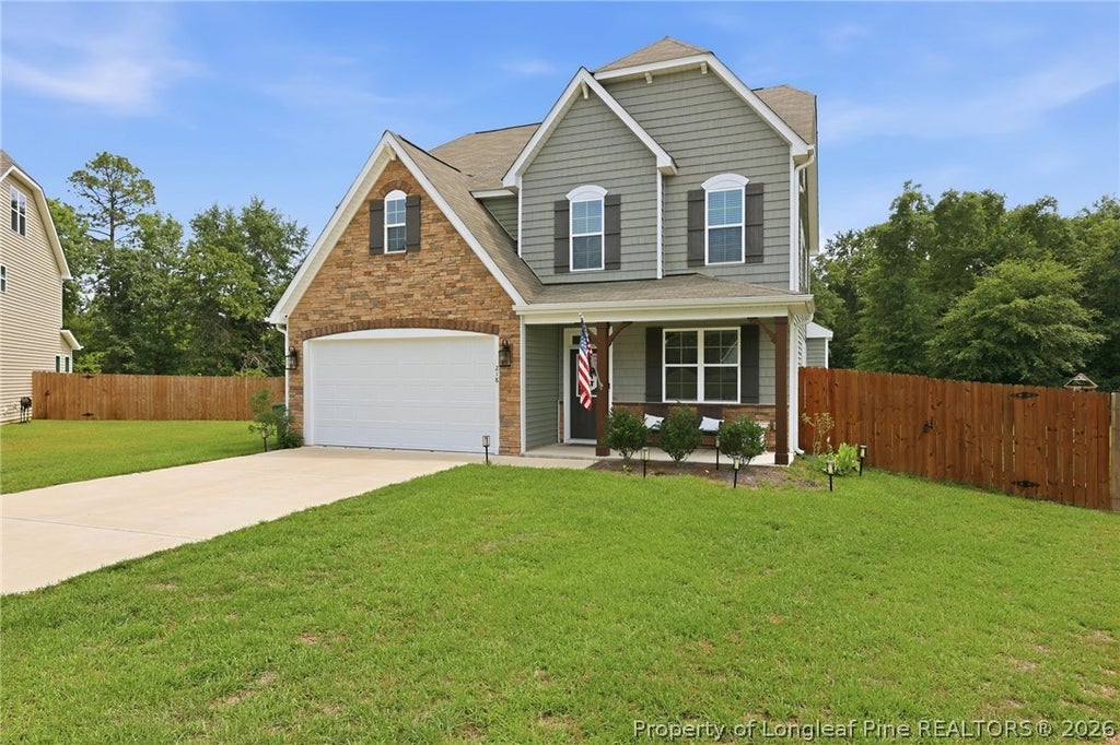 Photo of 218 Woodsrun Street, Raeford, NC 28376 (MLS # 764170)