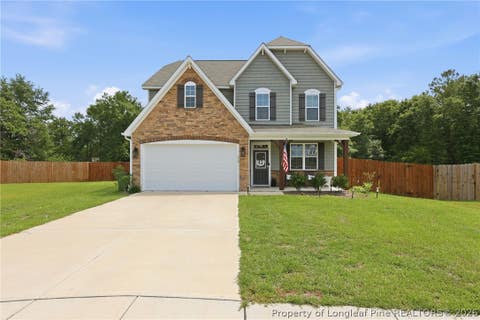 Photo of 218 Woodsrun Street, Raeford, NC 28376 (MLS # 764170)