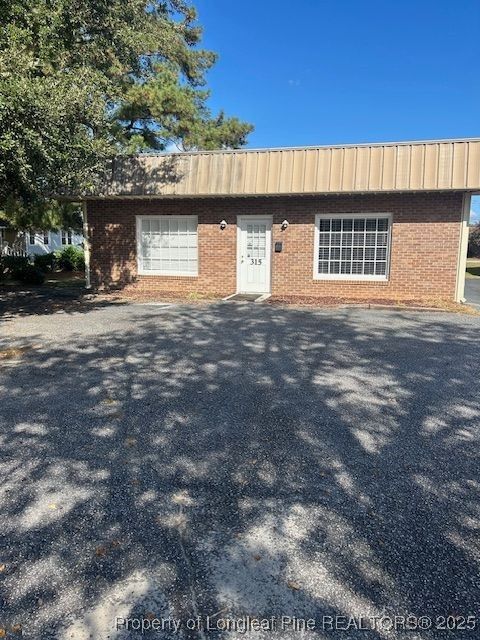 Photo of 315 E 20th Street, Lumberton, NC 28358 (MLS # 750670)