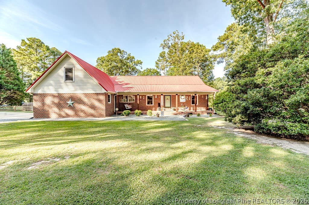 Photo of 5125 Lake Willett Road, Sanford, NC 27332 (MLS # 768071)