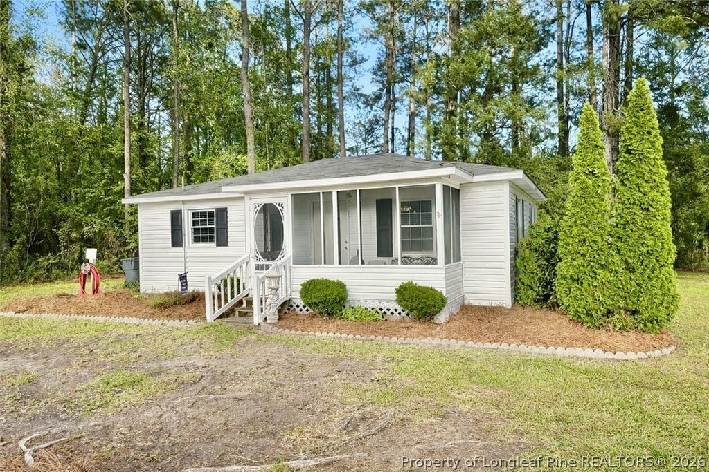 Photo of 593 Chair Factory Road, Nakina, NC 28455 (MLS # 761089)