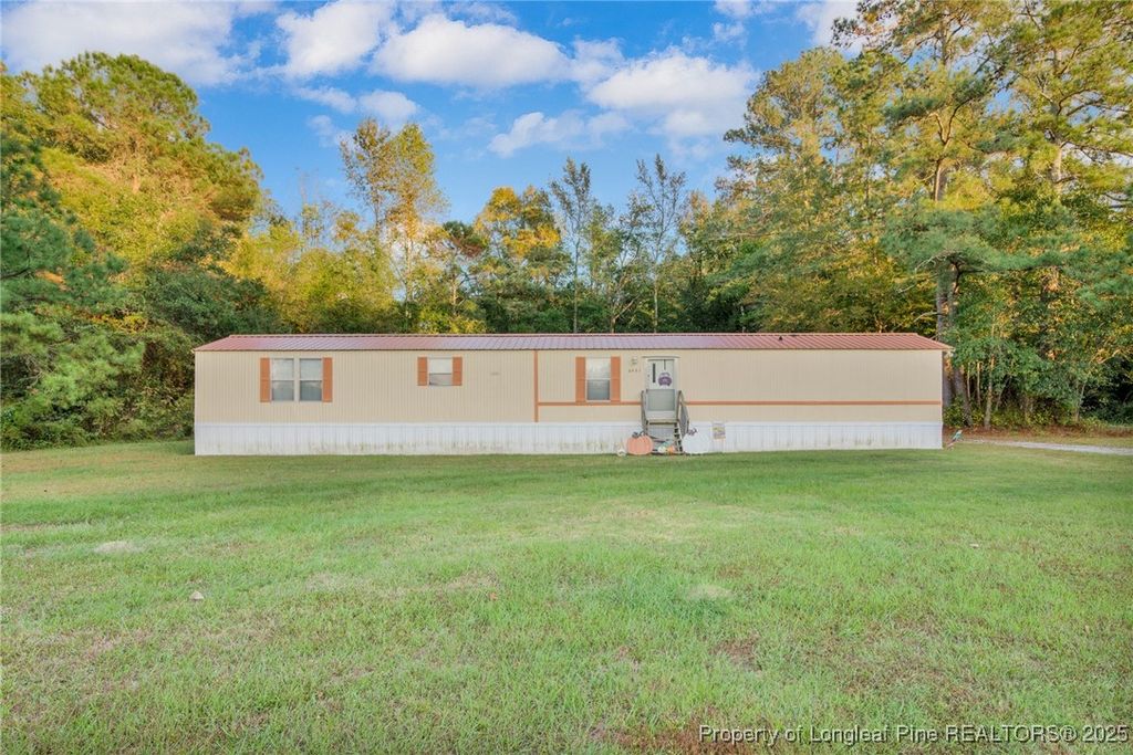 Photo of 6461 Wiregrass Road, Orrum, NC 28369 (MLS # 752000)