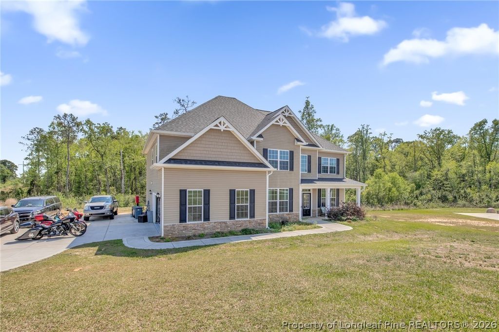 Photo of 6132 Shannon Woods Way, Hope Mills, NC 28348 (MLS # 760913)