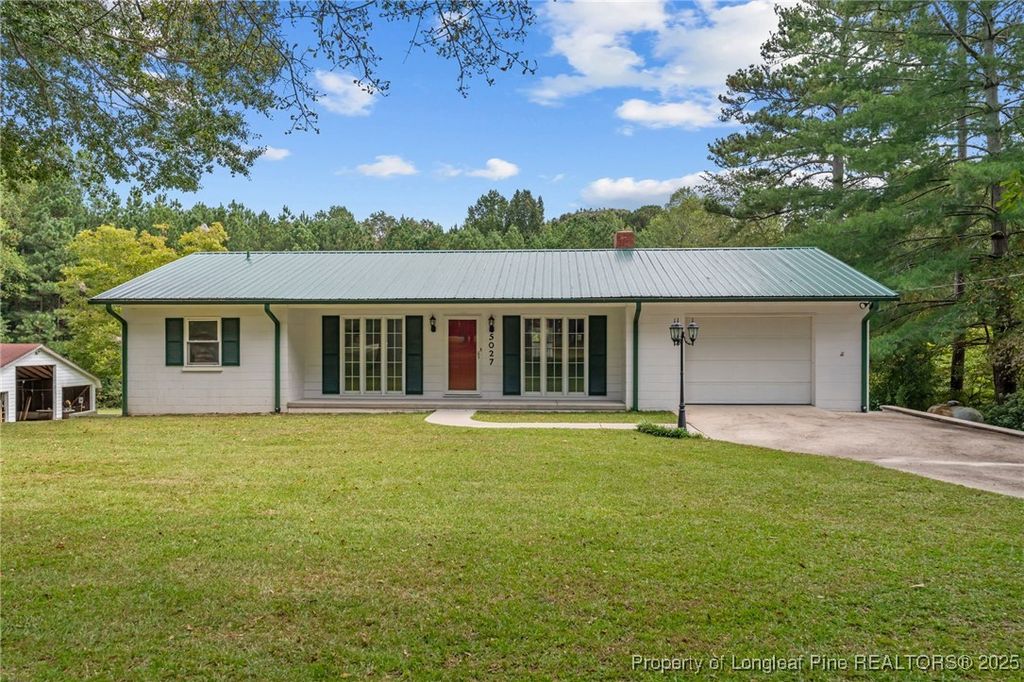 Photo of 5027 Lake Willett Road, Sanford, NC 27332 (MLS # 721183)