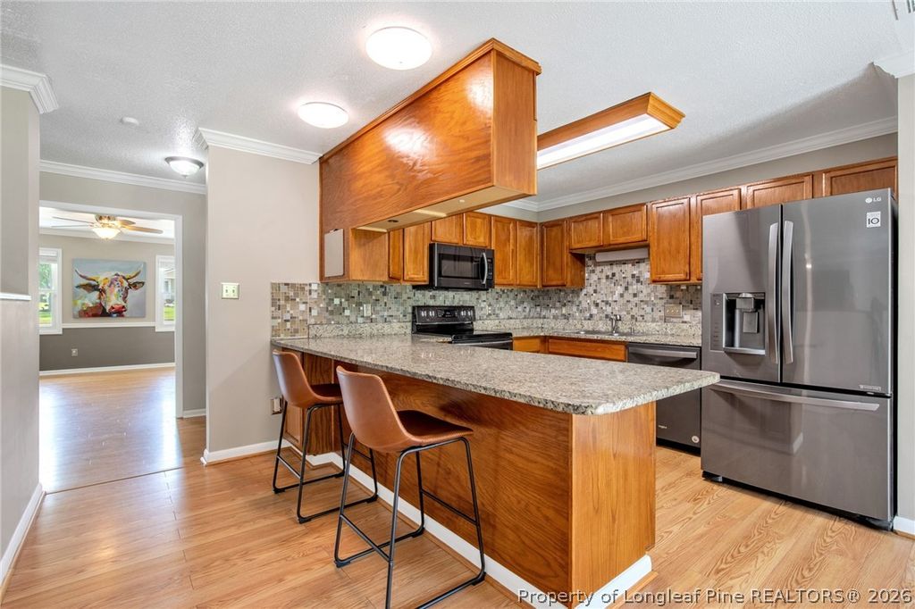 Photo of 6746 Weeping Water Run, Fayetteville, NC 28314 (MLS # 765563)