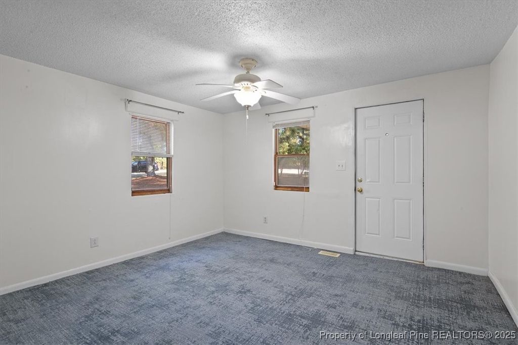 Photo of 663 Possum Holler Road, Eagle Springs, NC 27242 (MLS # 752052)