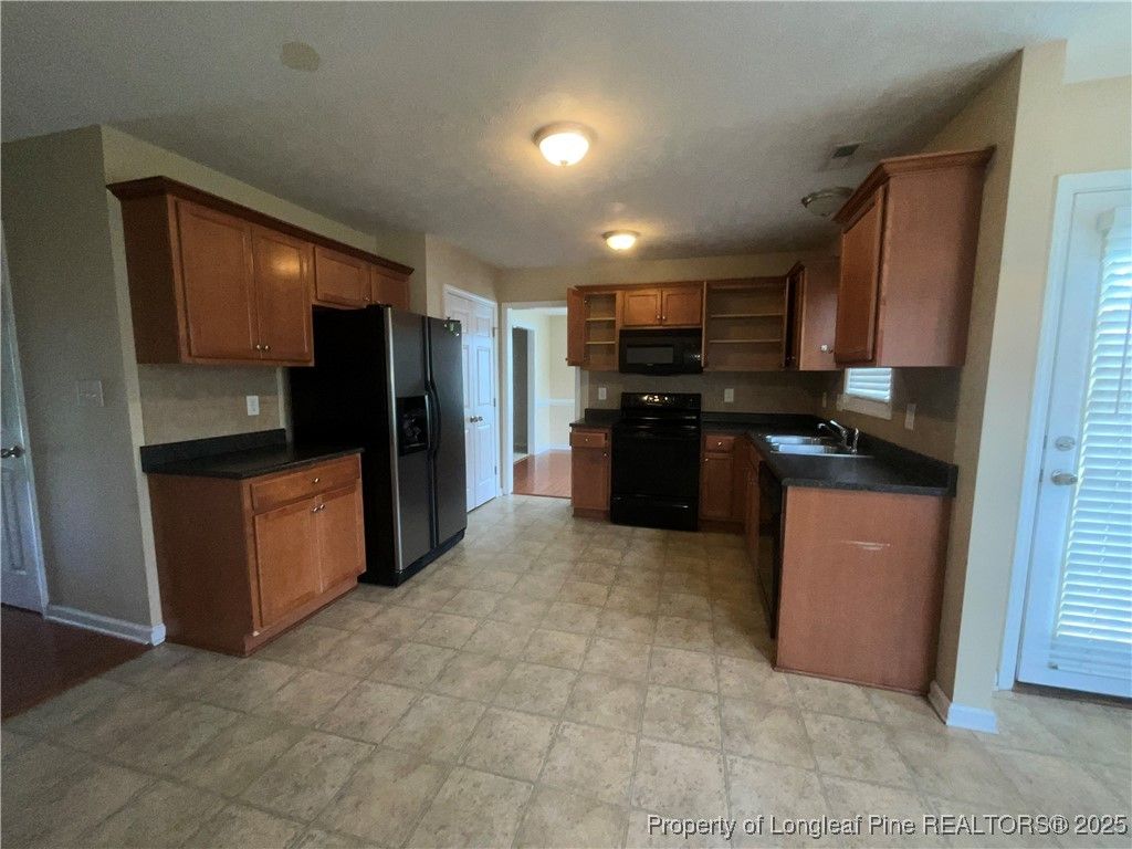 Photo of 223 Lochwood Drive, Raeford, NC 28376 (MLS # 750042)