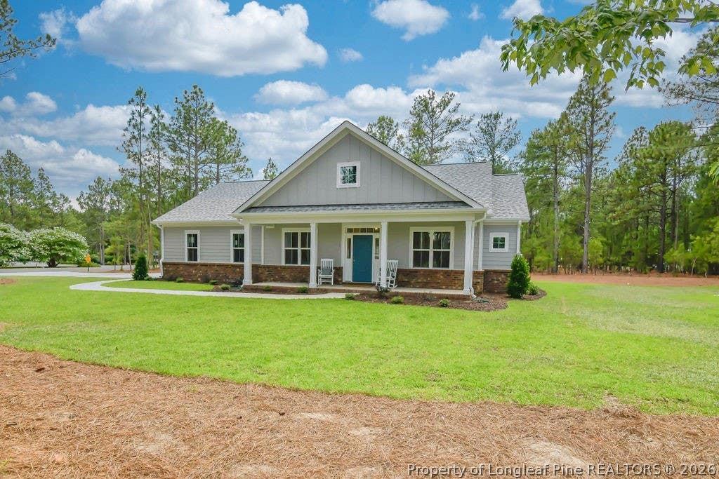 Photo of 120 Edgewater Drive, West End, NC 27376 (MLS # 767116)