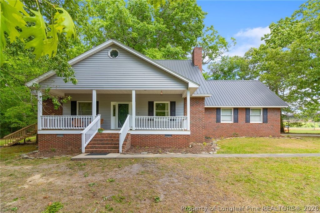 Photo of 751 Sheriff Watson Road, Sanford, NC 27330 (MLS # 761167)