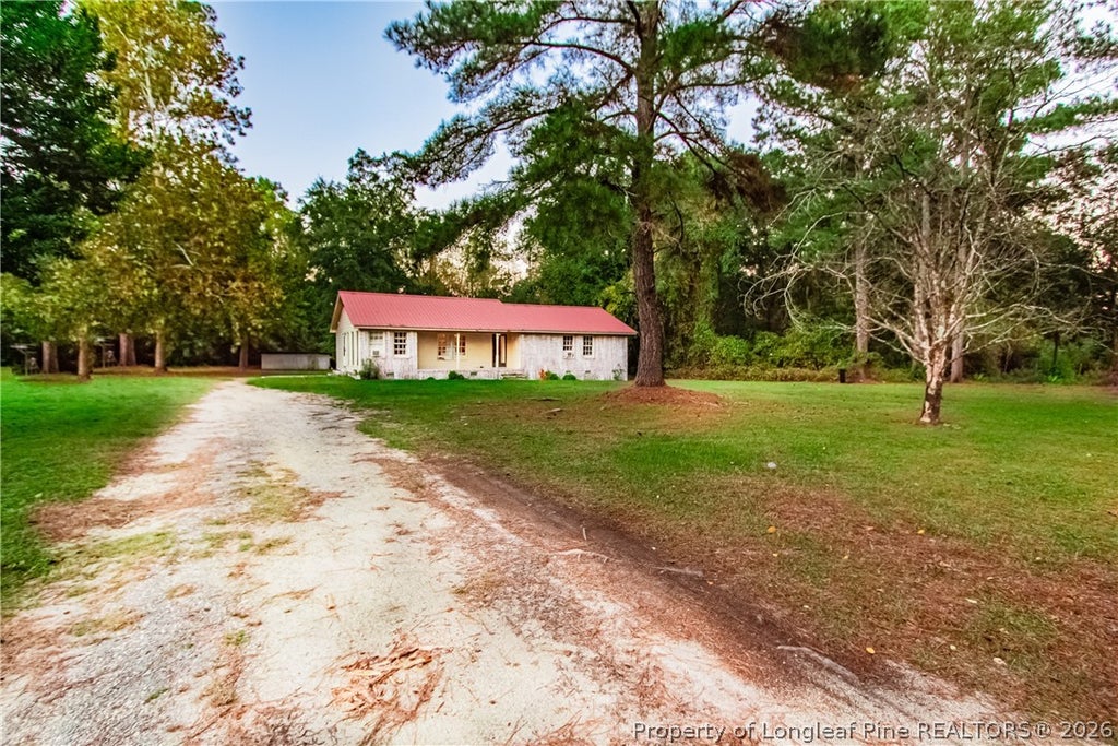 Photo of 9111 Clinton Road, Autryville, NC 28318 (MLS # 771723)