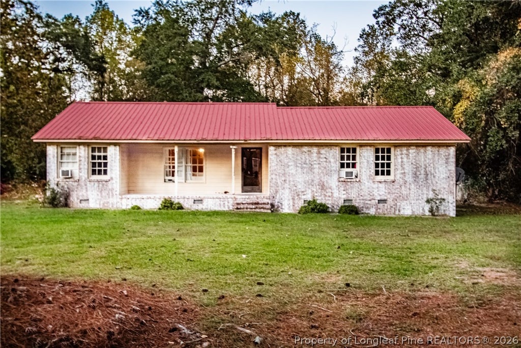 Photo of 9111 Clinton Road, Autryville, NC 28318 (MLS # 771723)