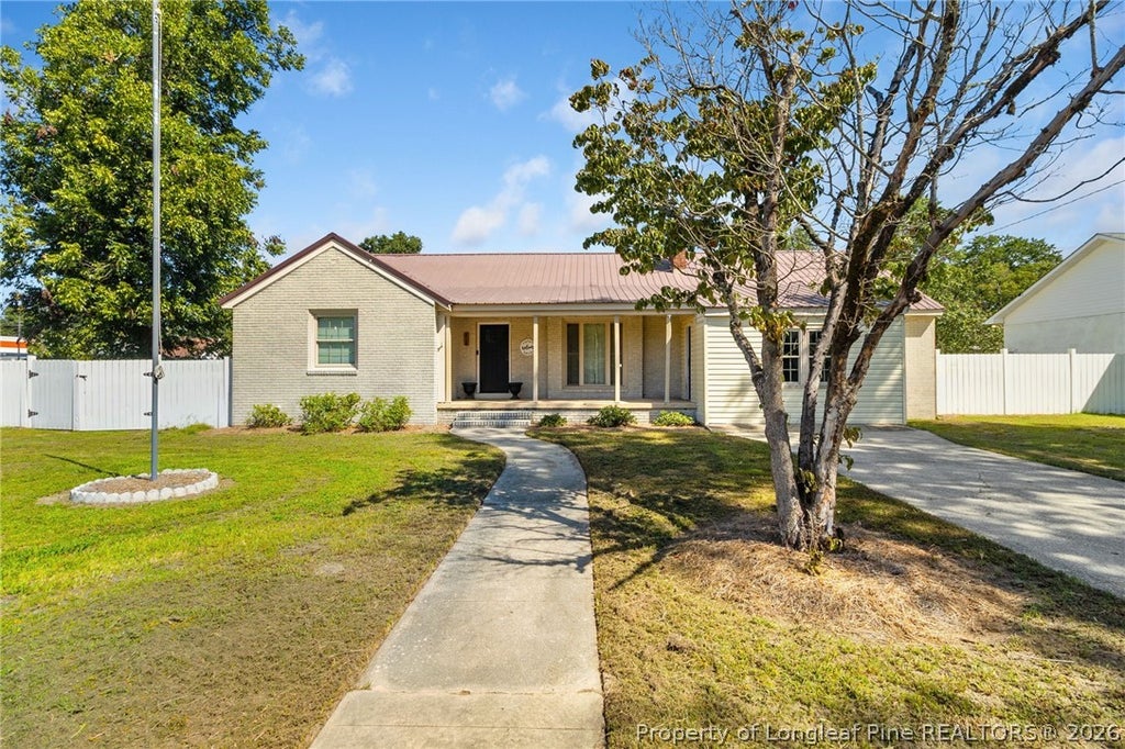 Photo of 410 W Mclean Street, St Pauls, NC 28384 (MLS # 768981)