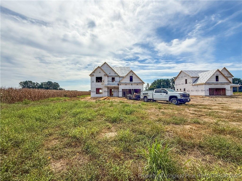 Photo of 308 Arabia (Lot 1) Road, Raeford, NC 28376 (MLS # 749467)