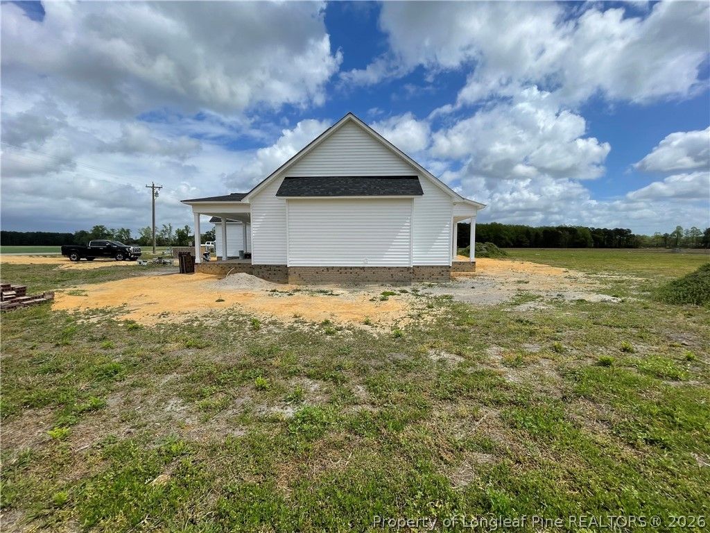 Photo of 1097 Purdie Hall Rd Road, Tar Heel, NC 28392 (MLS # 760129)