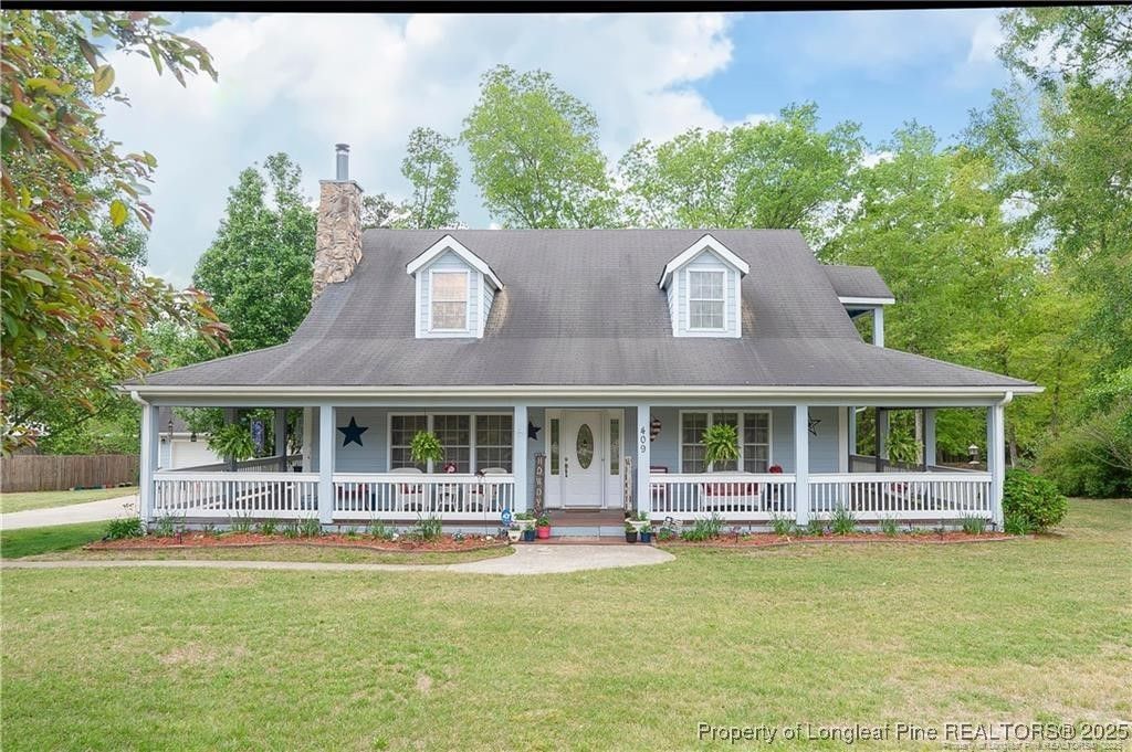Photo of 409 Mcphail Road, Raeford, NC 28376 (MLS # 749006)