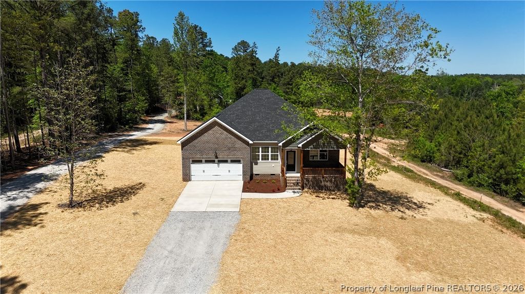 Photo of 5122 Steel Bridge Road, Sanford, NC 27330 (MLS # 761377)