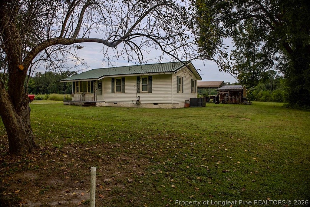 Photo of 799 Cain Road, St Pauls, NC 28384 (MLS # 769591)