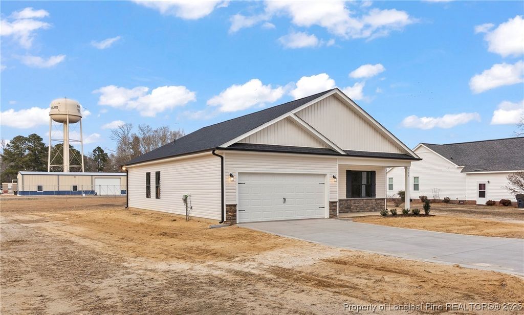 Photo of 106 Jackson Street, Salemburg, NC 28385 (MLS # 756456)