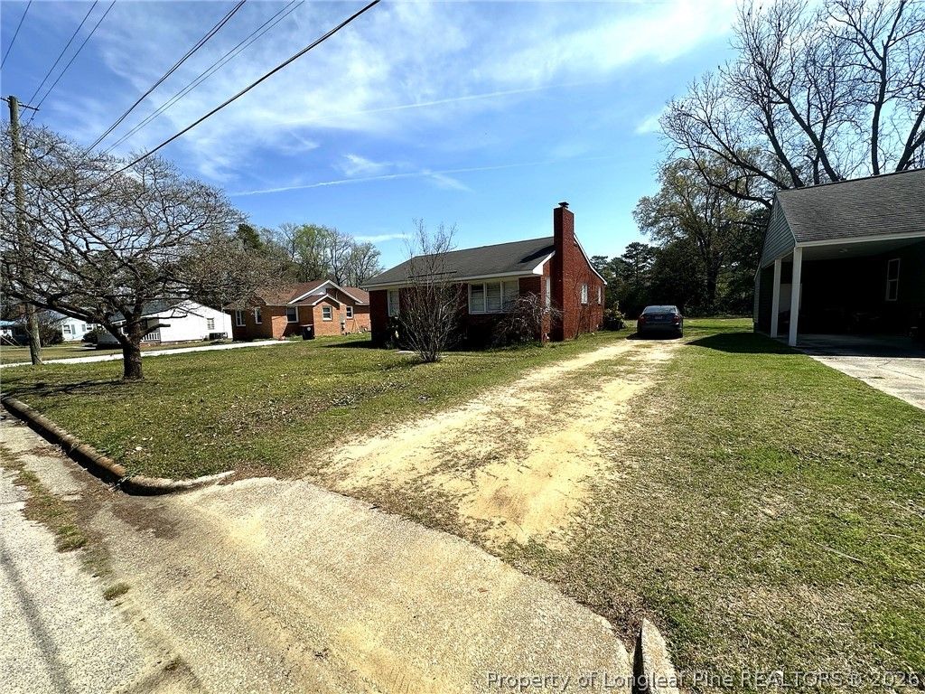 Photo of 202 N Edinborough Street, Red Springs, NC 28377 (MLS # 759269)