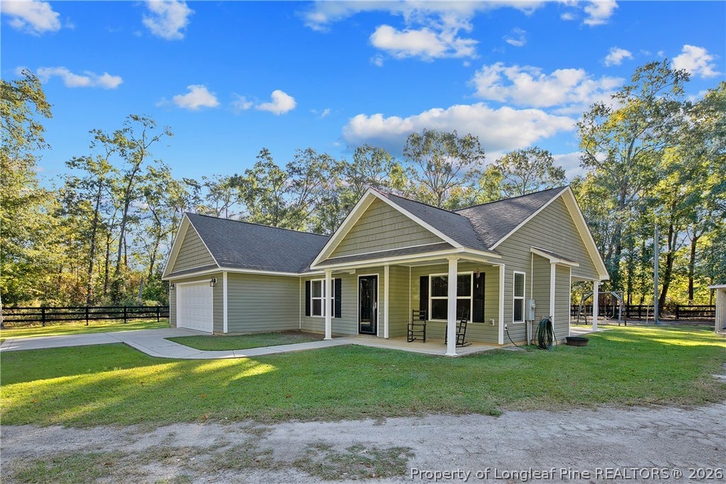 Photo of 8011 Chicken Foot Road, St Pauls, NC 28384 (MLS # 771469)