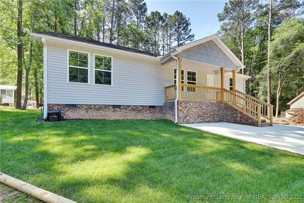 Photo of 1036 Meadow Reach Trail, Sanford, NC 27332 (MLS # 750472)