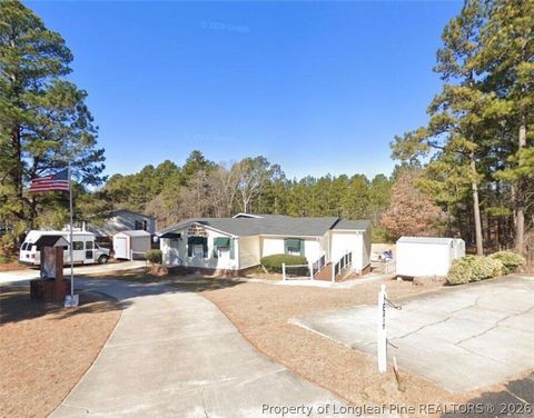 Photo of 100 Mcdougald Drive, Raeford, NC 28376 (MLS # 761018)