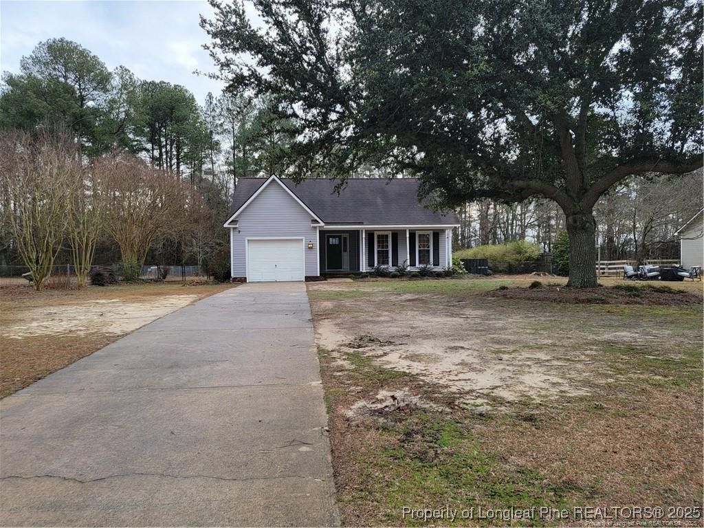Photo of 7029 Kalmia Lane, Hope Mills, NC 28348 (MLS # 752341)