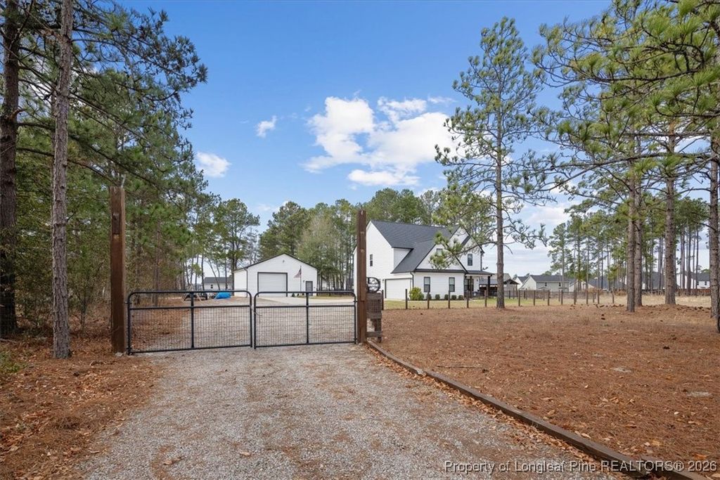 Photo of 411 Midway Drive, Raeford, NC 28376 (MLS # 755629)