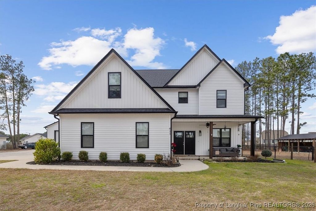 Photo of 411 Midway Drive, Raeford, NC 28376 (MLS # 755629)