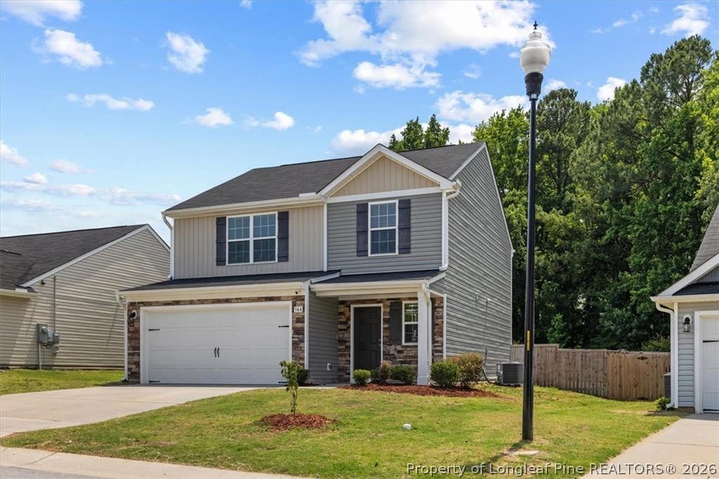 Photo of 344 Rustling Way, Zebulon, NC 27597 (MLS # 764108)