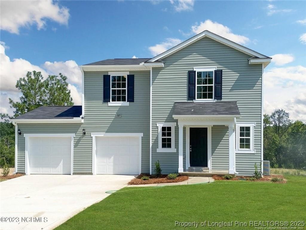 Photo of 307 Desert Orchid Circle, Raeford, NC 28376 (MLS # 747235)