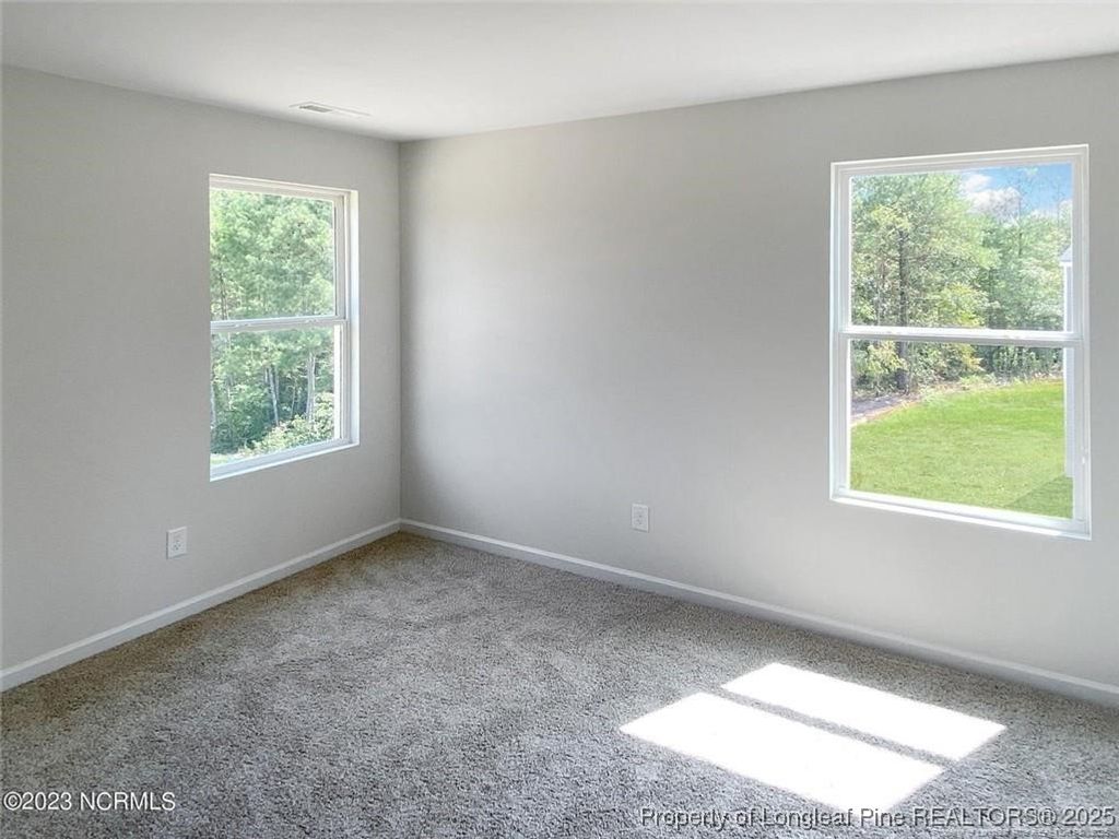 Photo of 307 Desert Orchid Circle, Raeford, NC 28376 (MLS # 747235)
