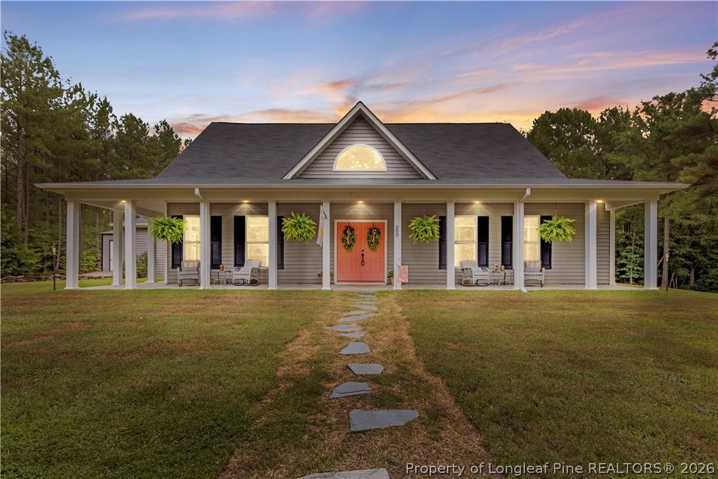 Photo of 300 Rustic Lane, Sanford, NC 27330 (MLS # 765454)