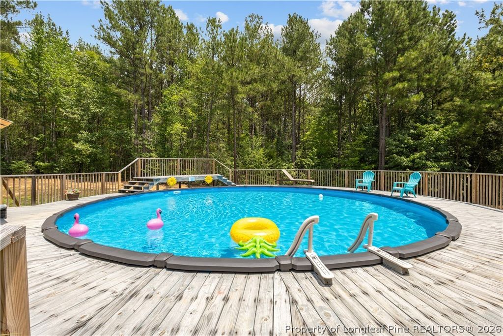 Photo of 300 Rustic Lane, Sanford, NC 27330 (MLS # 765454)