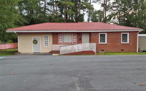 Photo of 701 Harris Avenue, Raeford, NC 28376 (MLS # 766189)