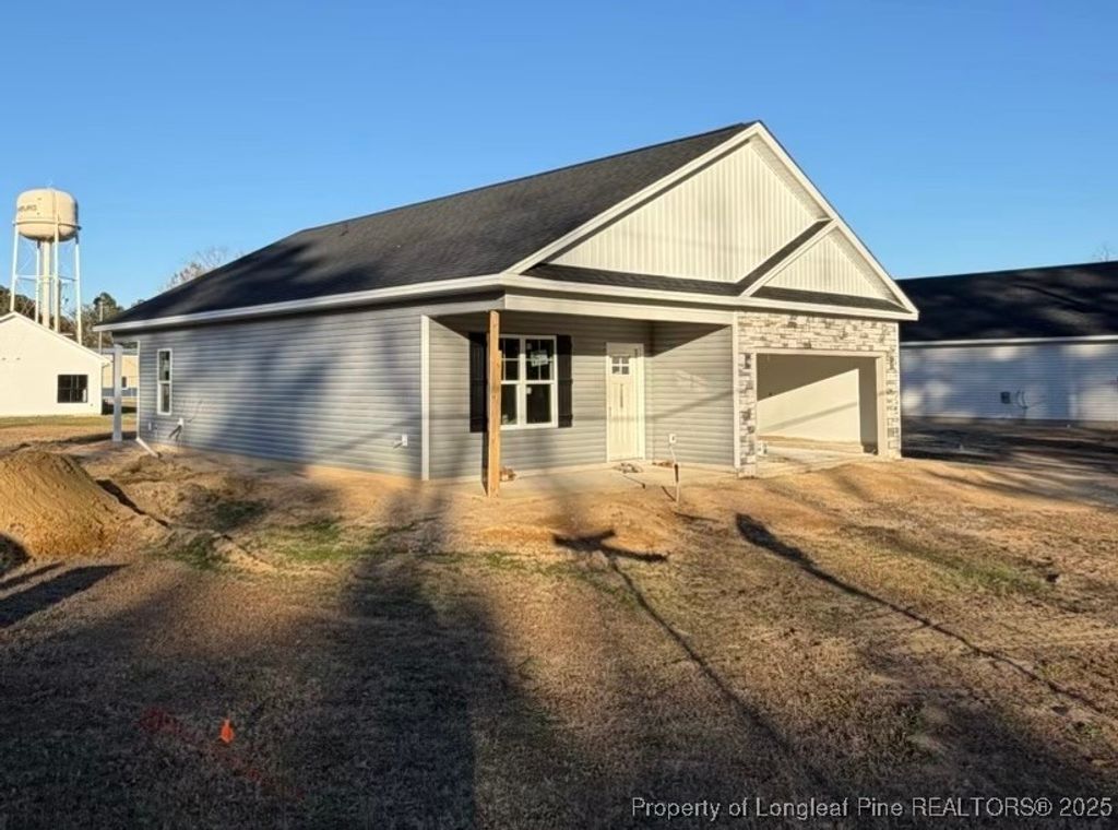 Photo of 108 Jackson Street, Salemburg, NC 28385 (MLS # 754598)