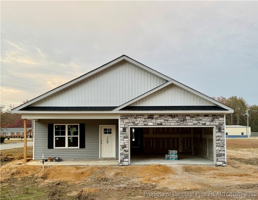 Photo of 108 Jackson Street, Salemburg, NC 28385 (MLS # 754598)