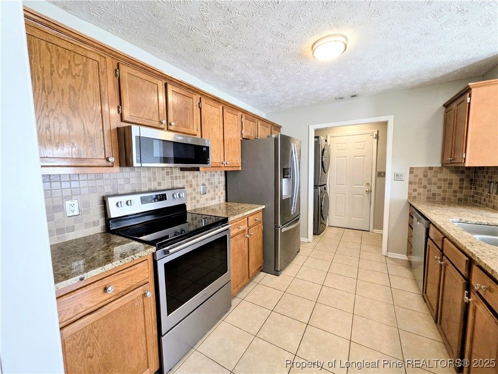 Photo of 2419 Lull Water Drive, Fayetteville, NC 28306 (MLS # 752292)