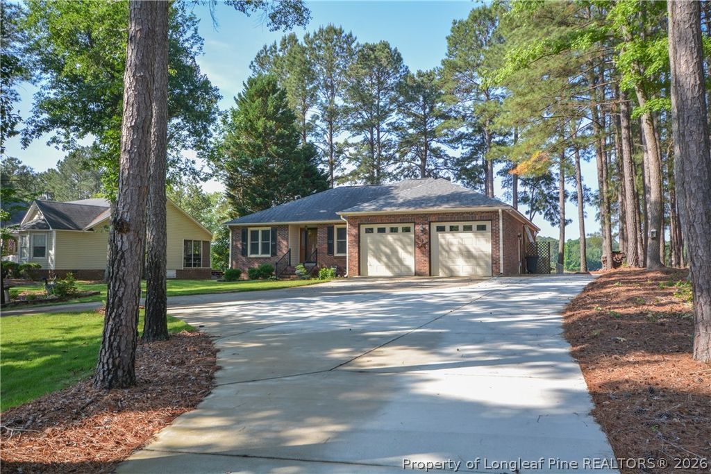 Photo of 18 Sandy Point, Sanford, NC 27332 (MLS # 762828)