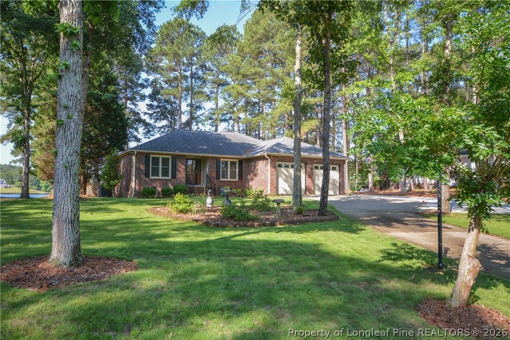 Photo of 18 Sandy Point, Sanford, NC 27332 (MLS # 762828)