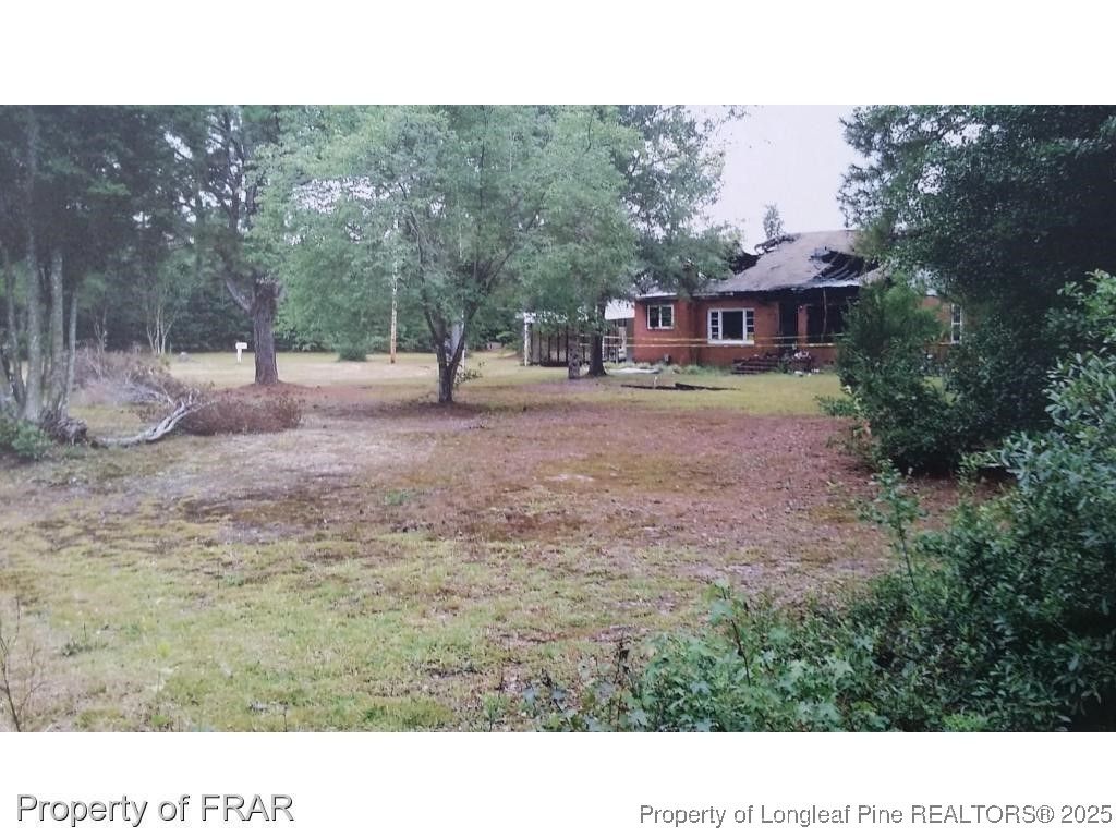 Photo of 7054 Elliott Bridge &amp; 21 Silk Floss Road, Spring Lake, NC 28390 (MLS # 750931)