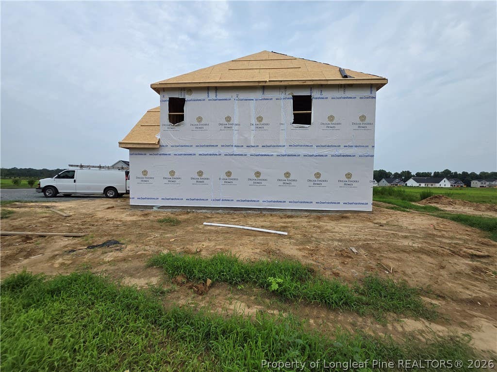 Photo of 79 Grady Farm Way, Benson, NC 27504 (MLS # 767314)