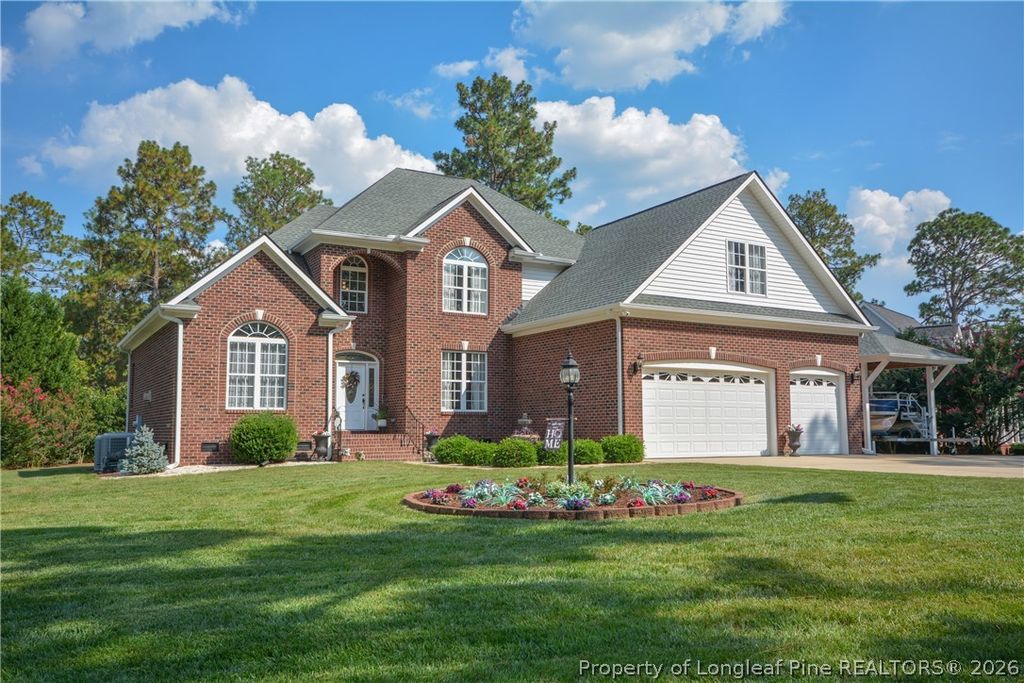 Photo of 92 Golf Drive, Sanford, NC 27332 (MLS # 766290)