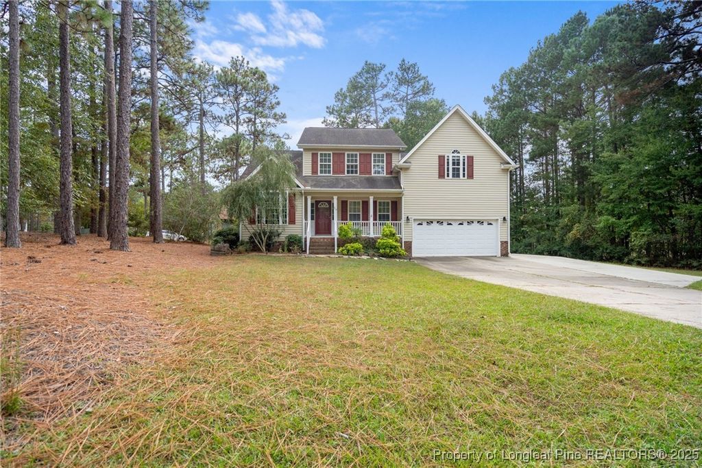 Photo of 25 Cove Landing, Sanford, NC 27332 (MLS # 751446)