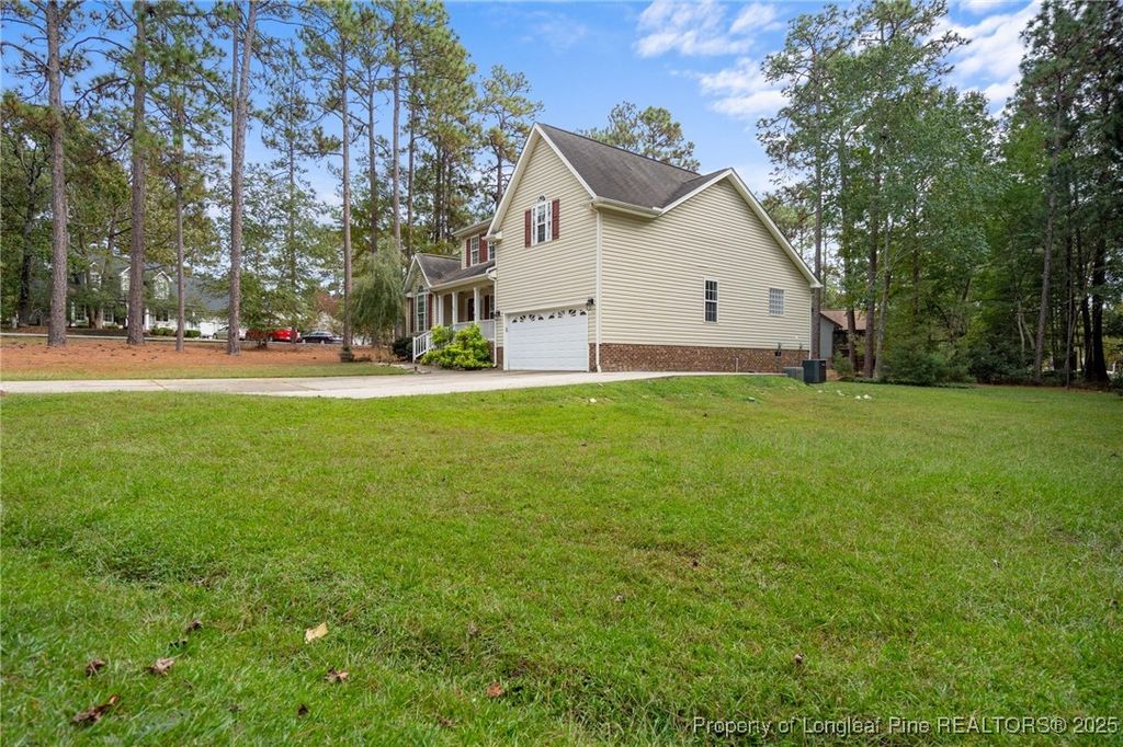 Photo of 25 Cove Landing, Sanford, NC 27332 (MLS # 751446)